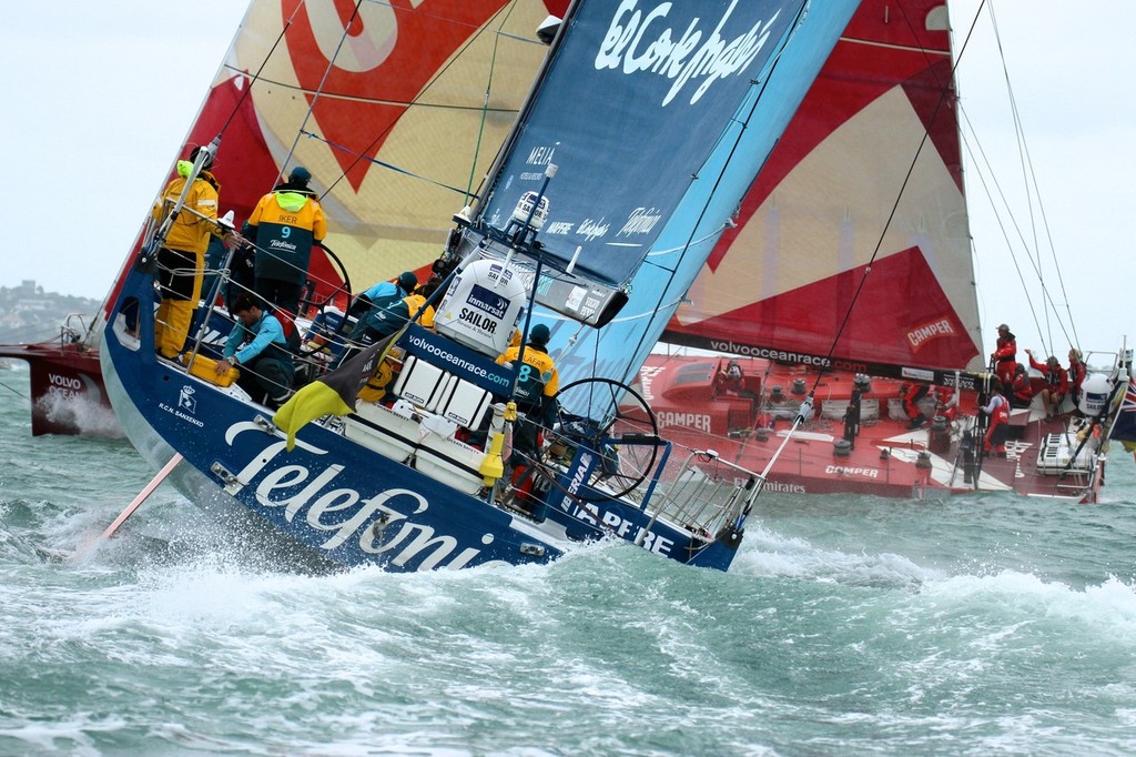 Telefonica crosses astern of Camper  - Volvo Ocean Race Auckland - Start March 18,2012 © Richard Gladwell www.photosport.co.nz